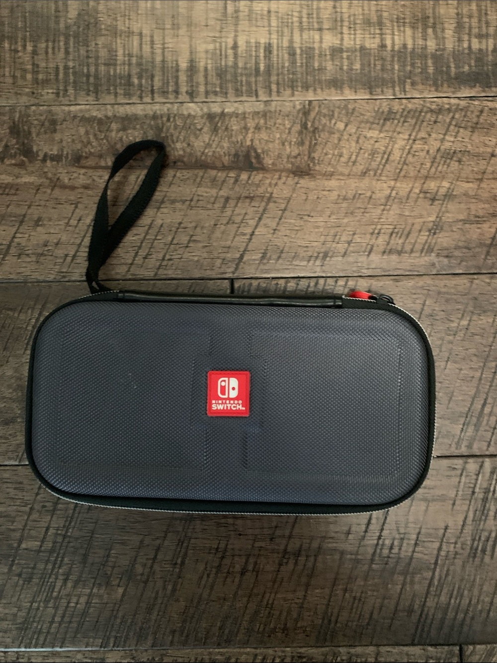 Nintendo Switch Gray Carrying Case with Red Logo